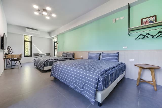 Deluxe Quadruple Room with Balcony