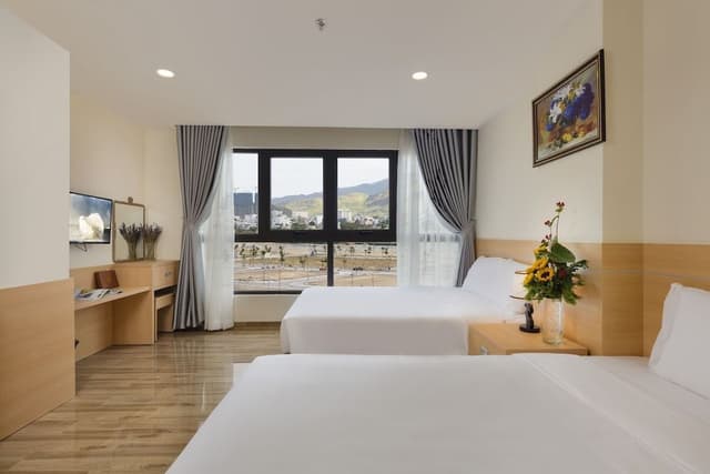 Deluxe Triple Room, City View