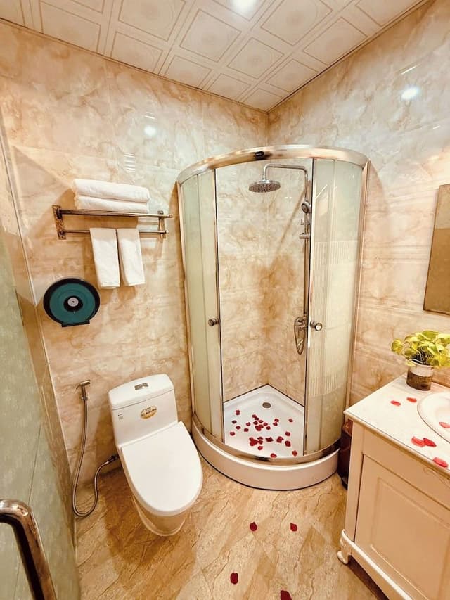 Deluxe Quadruple Room, 2 Queen Beds, Balcony, City View