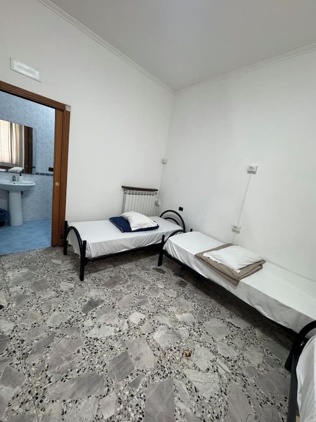 4 Single Bed Female Dorm with Private Bathroom