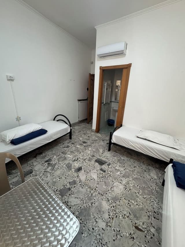 4 Single Bed Female Dorm with Private Bathroom