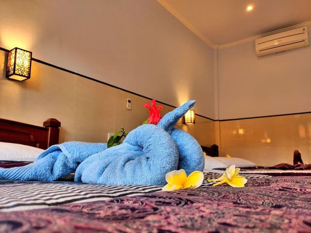 Deluxe Triple Room, Balcony, Pool View