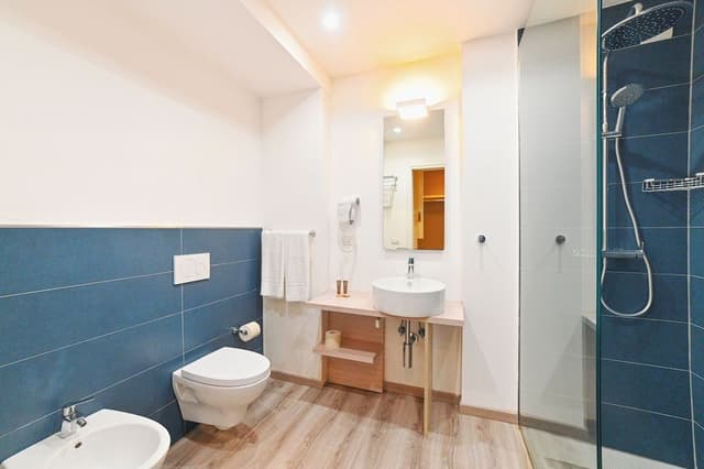 Appartamento vista giardino e mare con terrazzino