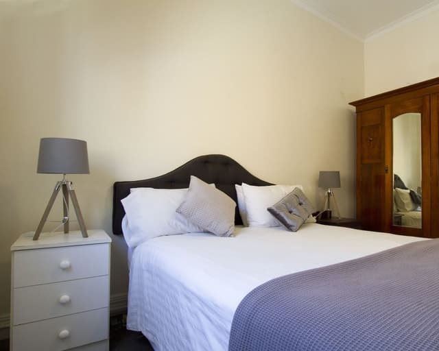 Basic Double Room, 1 Queen Bed, Shared Bathroom