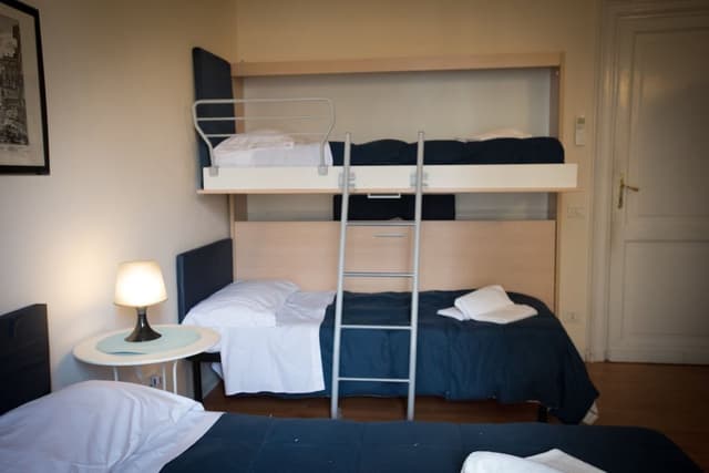 Economy Quadruple Room (External Private Bathroom)