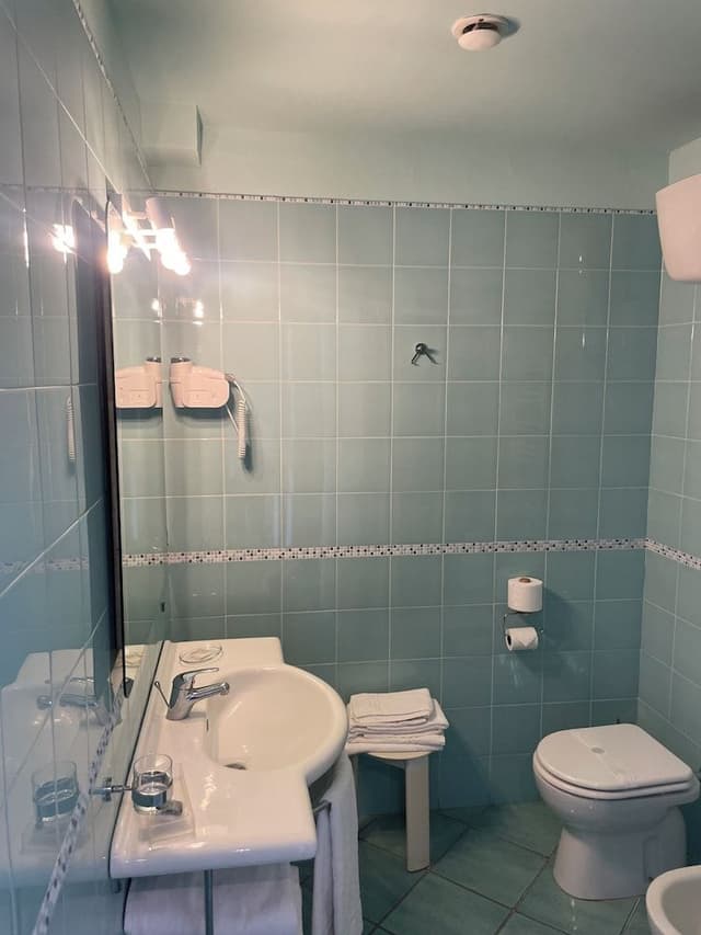 Camera Quadrupla (Letto matrimoniale + divano letto) in Edificio Separato con Terrazza.