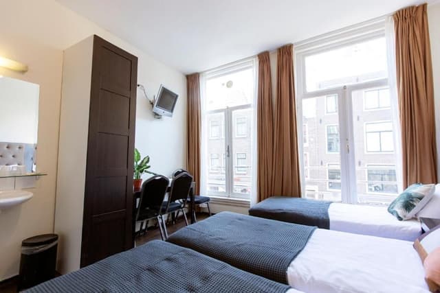 Quadruple Room with Shared Bathroom