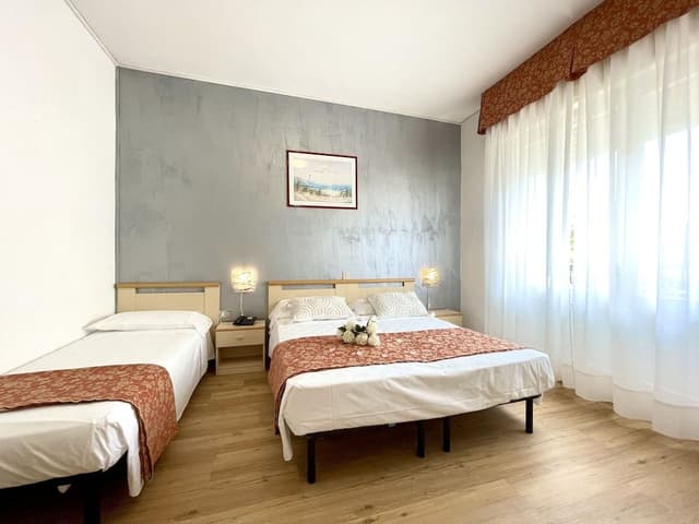 Triple Room (Parcheggio incluso)