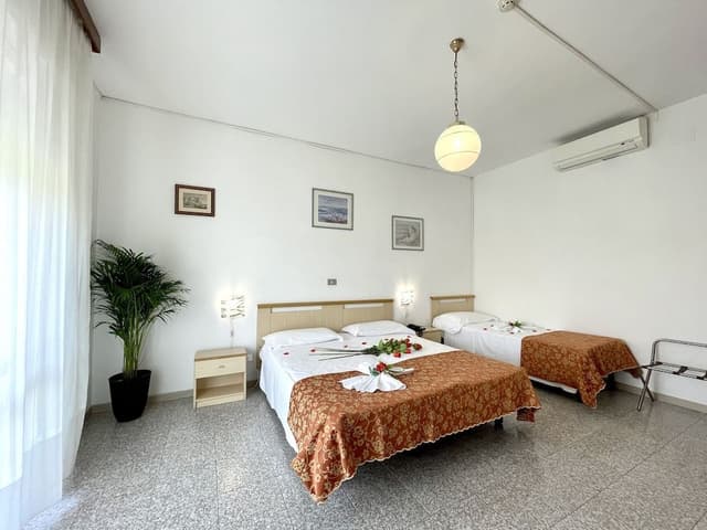 Triple Room (Parcheggio incluso)