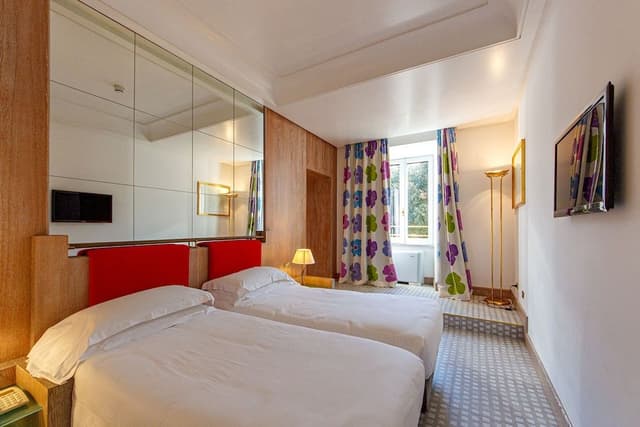 Camera Classic con letto matrimoniale o 2 letti singoli con Moquette o Pavimento