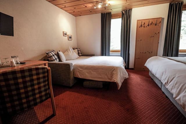 Double room with additional sofa bed