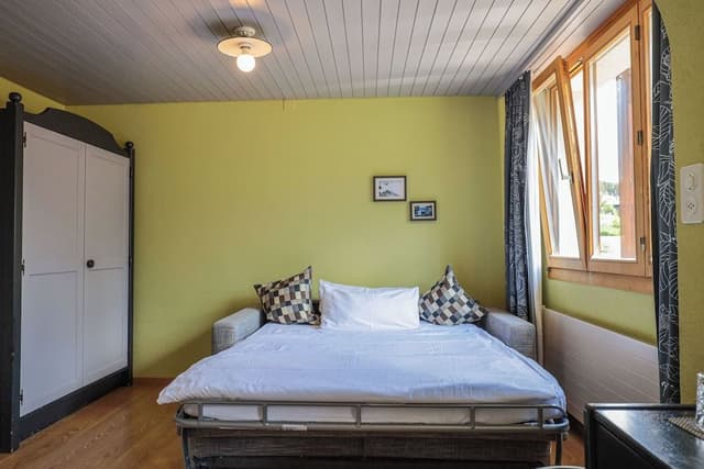 Double room with additional sofa bed