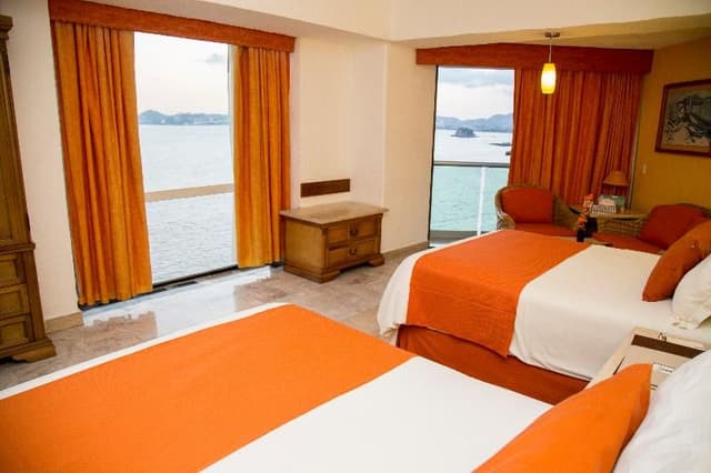 JUNIOR SUITE OCEAN VIEW TWO DOUBLE BEDS
