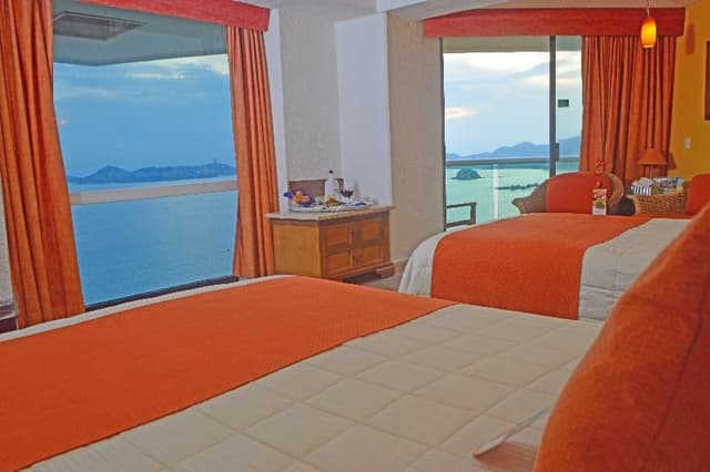 JUNIOR SUITE OCEAN VIEW TWO DOUBLE BEDS
