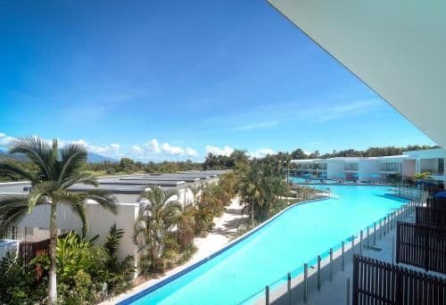 Two-Bedroom Apartment with Pool View Over a Pool