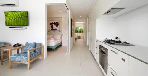 Two-Bedroom Apartment with Pool View Over a Pool