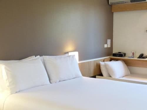 Standard Room with a Queen Bed and a Foldable Bed