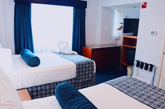 TWIN TWO QUEEN BEDS