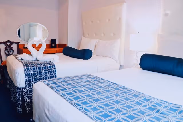 TWIN TWO QUEEN BEDS