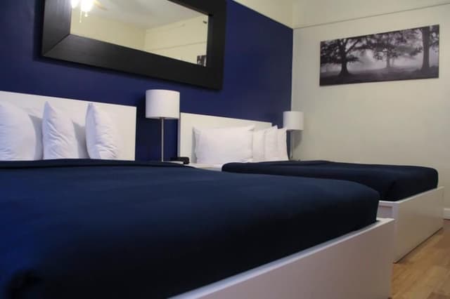 DOUBLE TWO DOUBLE BEDS