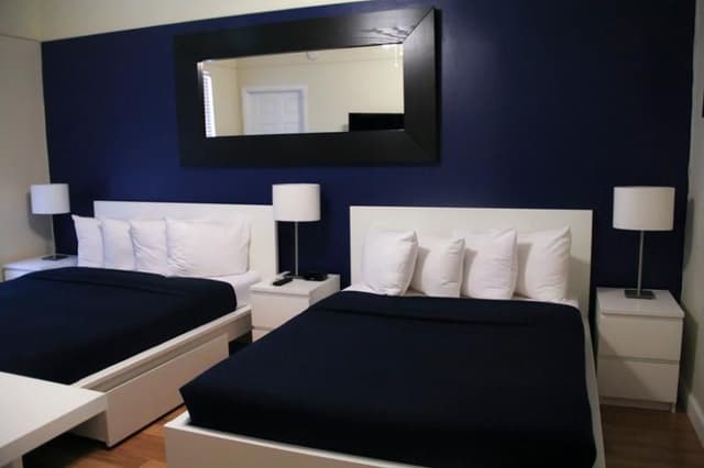 DOUBLE TWO DOUBLE BEDS