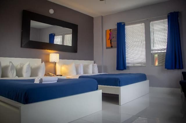 DOUBLE TWO DOUBLE BEDS