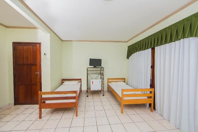 Bed in dormitory WITH SHARED BATHROOM