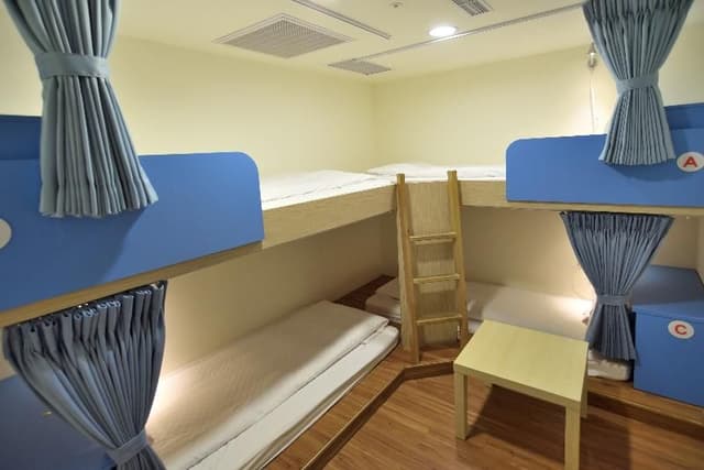 Bed in dormitory FEMALE ROOM