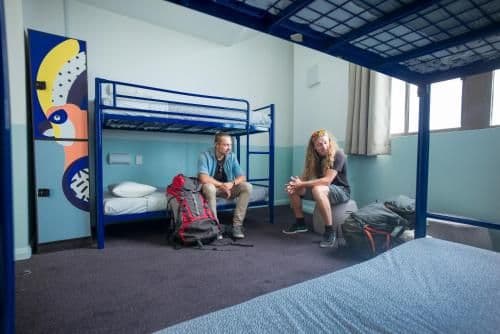Bed in 4-Bed Male Dormitory Room with Shared Bathroom