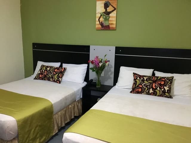 DOUBLE TWO DOUBLE BEDS