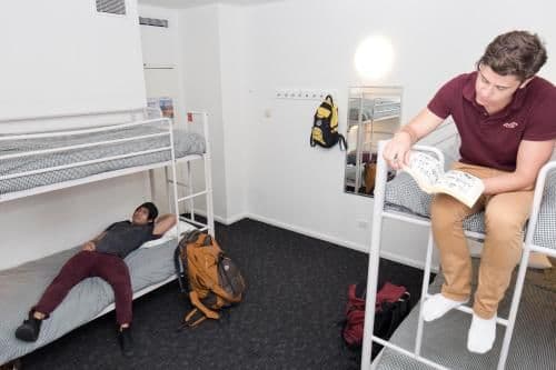 Bed in 4-Bed Male Dormitory Room with Shared Bathroom