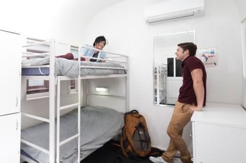 Bed in 4-Bed Male Dormitory Room with Shared Bathroom