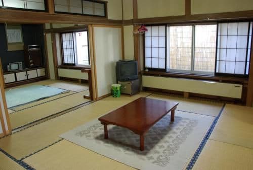 Japanese-Style Large Family Room with Shared Bathroom