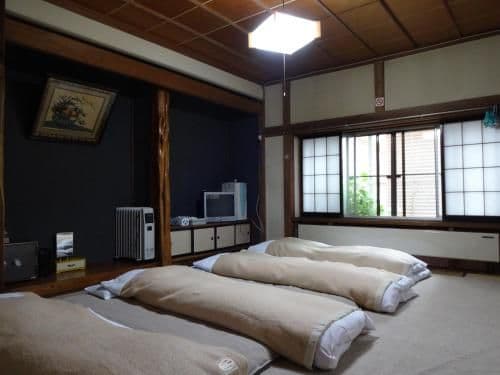 Japanese-Style Large Family Room with Shared Bathroom