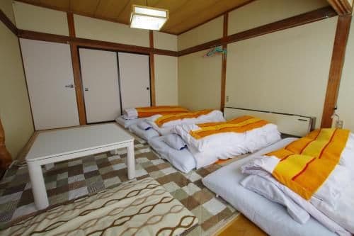 Japanese-Style Family Room with Shared Bathroom