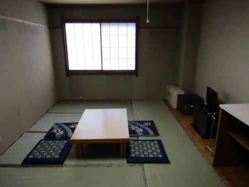 Quadruple Room with Shared Bathroom