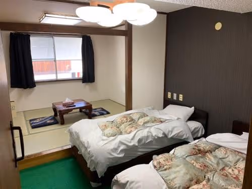Quadruple Room with Shared Bathroom