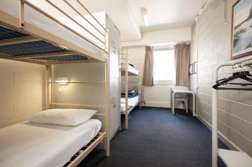 Bed in 4-Bed Female Dormitory Room with Shared Bathroom