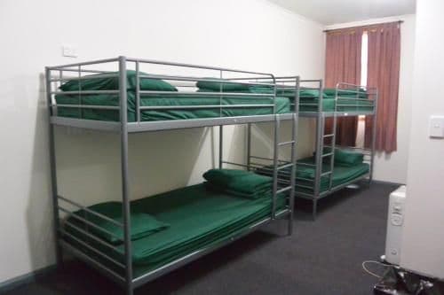 Bed in 8-Bed Female Dormitory Room with Shared Bathroom