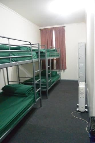 Bed in 8-Bed Female Dormitory Room with Shared Bathroom