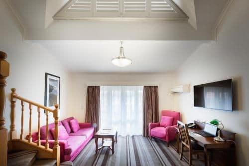 Deluxe King Loft with Sofa Bed Courtyard View
