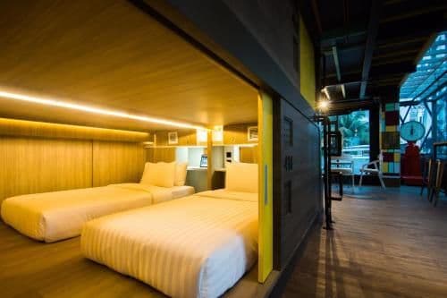 Twin Capsule Suite with Shared Bathroom