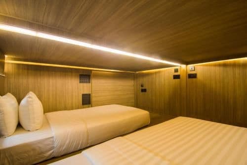 Twin Capsule Suite with Shared Bathroom