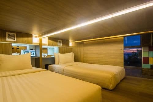 Twin Capsule Suite with Shared Bathroom