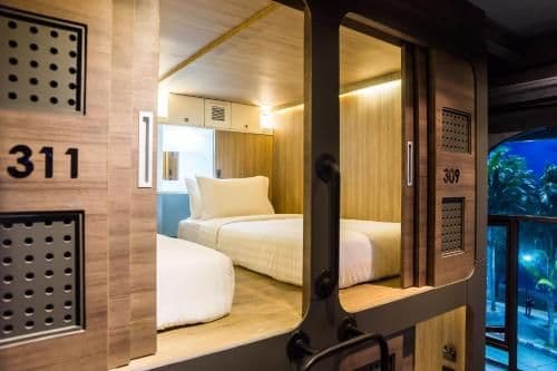 Twin Capsule Suite with Shared Bathroom