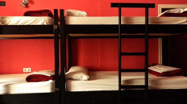 Bed in dormitory WITH SHARED BATHROOM