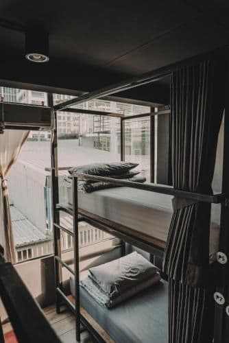 8 Bunk Bed in Mixed Dormitory with Curtain and City View