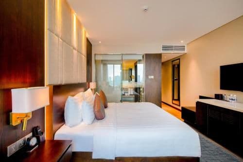 Deluxe Double - one drink voucher at OQ bar
