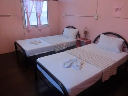 Single Bed in Dormitory Room