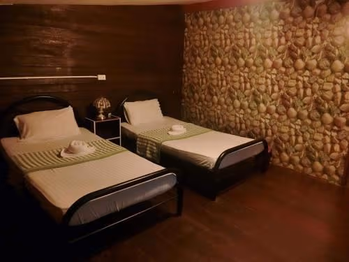 Single Bed in Dormitory Room